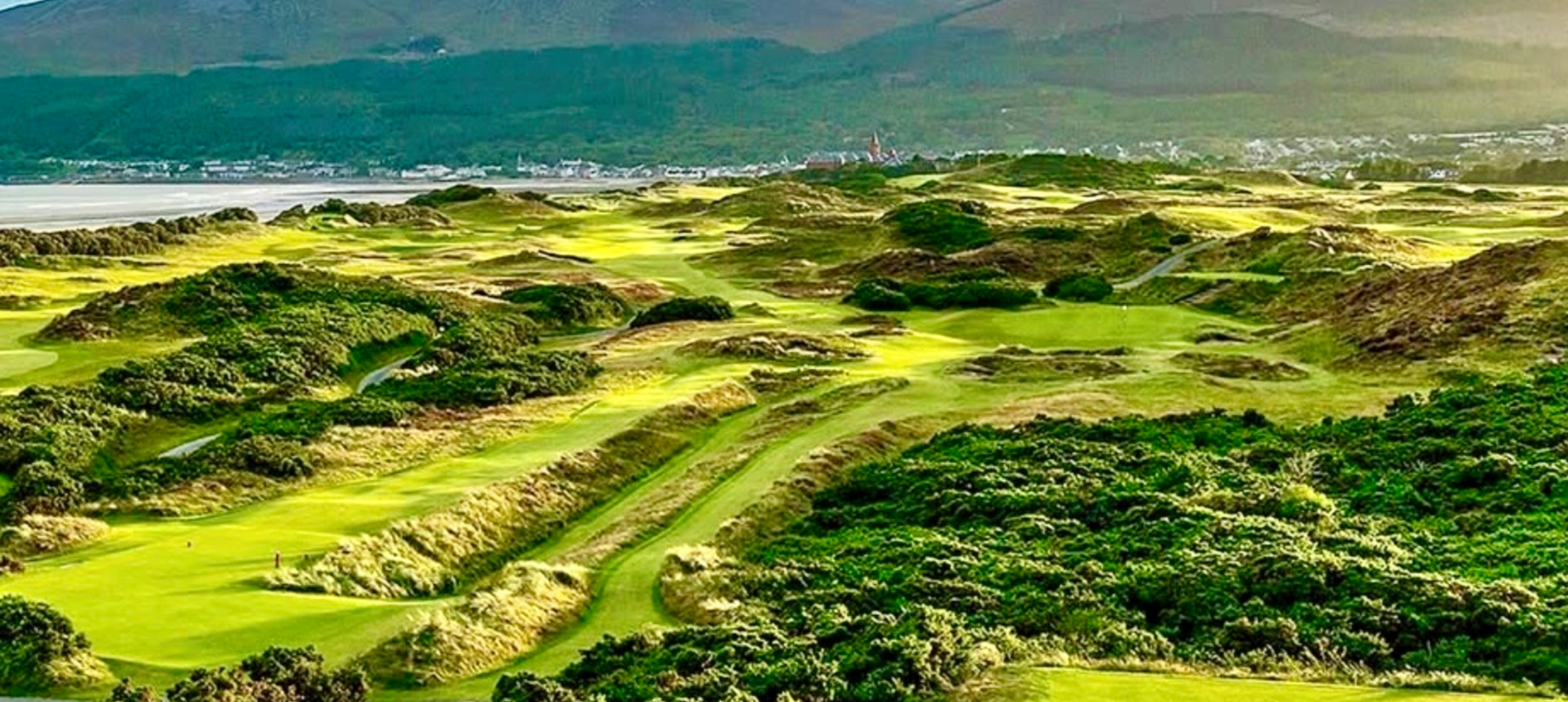 Scenic view of lush green golf course.